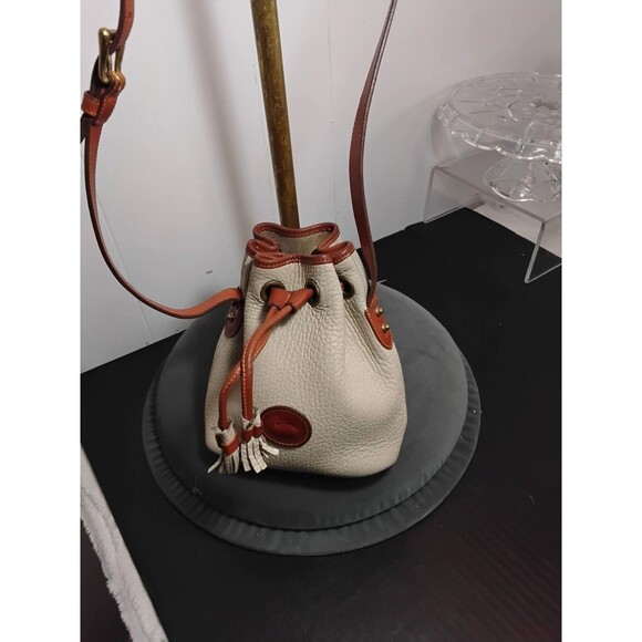 Dooney & Bourke Vintage Drawstring Small Bucket Bag All Weather Leather - Picture 1 of 6